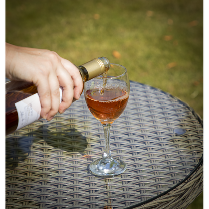 Dellonda Chester Rattan Wicker Round Outdoor Table with Tempered Glass Top
